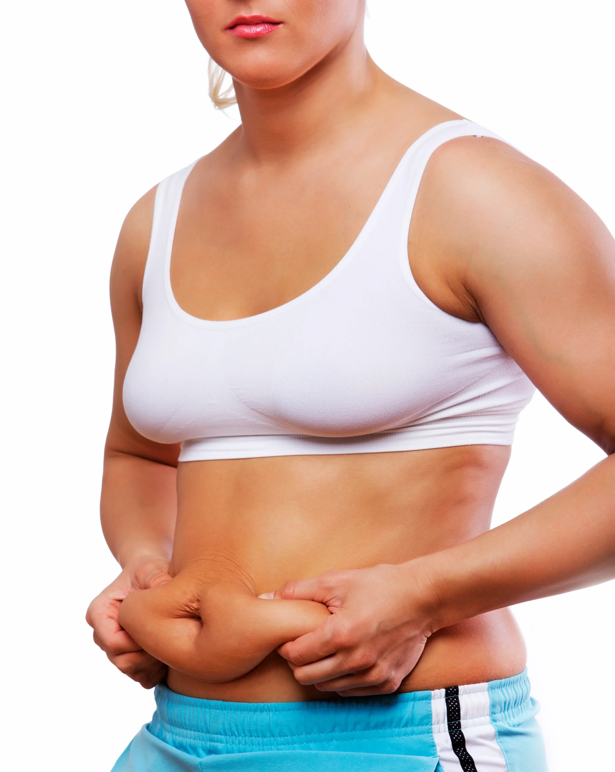 Side profile of a woman with localized abdominal fat, identifying a candidate for stomach liposuction in Dubai.
