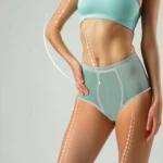 A cropped frontal view of a woman’s sculpted torso and thighs in sage green high-waisted briefs and a light blue top, featuring white digital vector lines and arrows across her waist and legs to illustrate the target zones for Lipo 360 Dubai.